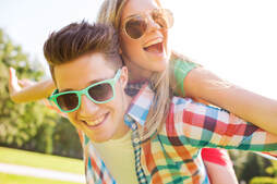 happy young people in sunglasses